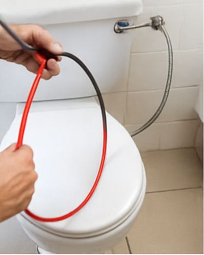 Professional blocked drain plumber in Hurstville using high-pressure jet blaster